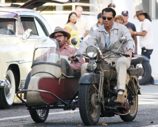 johnny depp is classic cool driving a vintage motorcycle